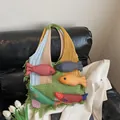 Green knit tote bag with colorful 3D fish ornaments and bohemian tassel trim - Green