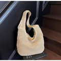 Chic beige straw woven tote bag with wide shoulder strap on wooden stairs for summer vacation - Without Flower / Beige