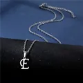 Macro detail of silver stainless steel letter E pendant necklace with lobster clasp - Letter E