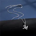 Detail of silver letter M pendant with polished finish and adjustable lobster clasp chain - Letter M