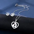 Polished stainless steel heart lock necklace and earrings set on a premium display stand - Heart Lock Necklace Earrings Set (TZ-57) / Silver