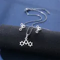 Polished silver hexagram necklace and earrings set displayed on a sleek black stand - Triple Star Style (TZ-130)