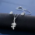 Silver leaf pendant necklace and earrings set displayed on a dark blue jewelry roll - Leaf Style (TZ-106)