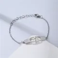 Minimalist stainless steel bracelet with geometric star plate on a white pedestal - Star Plate Style (NL10)