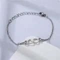 Polished stainless steel double heart charm bracelet with adjustable chain on stone - Minimalist Double Heart (NL9)