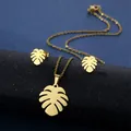 Golden monstera leaf jewelry set with hollow leaf pendant necklace and matching stud earrings - Monstera Leaf Style (TZ-146 Gold)