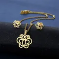 Elegant gold butterfly jewelry set with necklace and stud earrings on black stand - Symmetrical Hollow Butterfly Style (TZ-150 Gold)