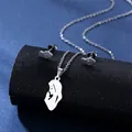 Dettaglio del set di gioielli in acciaio argento con eleganti ciondoli a silhouette - Stile Silhouette Ritratto (TZ-184 (Argento))