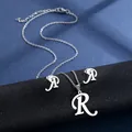 Poliertes silbernes Edelstahlschmuck-Set mit geschwungener Buchstabe R Halskette und Ohrringen - Buchstabe R / Silber
