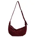 Detail of burgundy half-moon crossbody bag with matte finish and knotted shoulder strap - Red