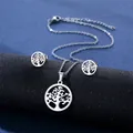 Detailed view of silver tree of life necklace and earrings set on black pedestal - Tree of Life Style 1 (TZ-97)