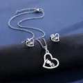 Silver stainless steel heart jewelry set with LOVE engraving on a black display stand - Hollow LOVE Style (TZ-96)