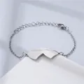 Detail of adjustable silver stainless steel bracelet featuring minimalist double hearts - Double Heart Style (NL5)