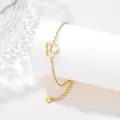 Bracciale minimalista in acciaio inossidabile dorato con ciondoli a doppio cuore traforato - Oro
