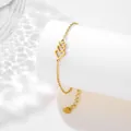 Elegante bracciale in argento S925 placcato oro con tre ciondoli a cuore traforati - Stile Cuore Oro (SLJ31)