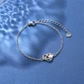 Detail of silver stainless steel heart pendant with LOVE Mama engraving on blue background - LOVE Mama Style (XLY27 Steel)