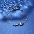 Elegant stainless steel flower pendant bracelet with adjustable chain on blue water background - Sunflower Style (XLY110)