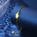 Golden stainless steel turtle pendant bracelet on a ripple blue background - Small Turtle Crab Style (XLJ130)