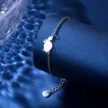 Silver stainless steel turtle bracelet with minimalist crab pendant on blue water backdrop - Turtle Style (XLY130)
