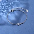 Close-up of stainless steel bracelet with Eiffel Tower charm and S.Steel heart tag - Eiffel Tower Style (XLY35 Steel)