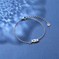 Detail of stainless steel bracelet featuring star-shaped links and adjustable lobster clasp - Abstract Star Style (XLY48 Steel)