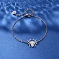 Silver stainless steel spider pendant bracelet with lobster clasp on blue background - Spider Style (XLY106)