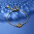 Minimalist gold stainless steel eye bracelet with hollow round pendant on blue water texture - Sun Radiance Style (XLJ107)