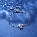 Polished stainless steel turtle pendant bracelet with adjustable chain on blue background - Sea Turtle Style (XLY115)
