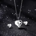 Polished stainless steel heart pendant necklace and stud earrings set for women - Cracked Hollow Heart Style (TZ-405)