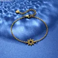 Elegant gold stainless steel sun pendant bracelet with adjustable chain on blue background - Sun Star Style (XLJ109)