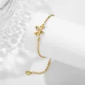 Bracelet en acier inoxydable doré avec feuille de houx et breloque en cœur - Décembre