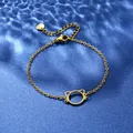 Detailed view of golden cat-shaped pendant on stainless steel chain with lobster clasp - Cat Head Outline Style (XLJ114)