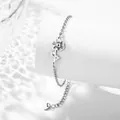 Minimalist stainless steel bracelet featuring a hollow daisy pendant and adjustable chain - October