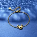Close-up of golden stainless steel elk pendant bracelet on blue wavy background - Elk Shape Style (XLJ120)