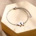 Bracelet puzzle en acier inoxydable poli avec découpe cœur sur support en bois - Style Puzzle Cœur (XLY187) / Argent