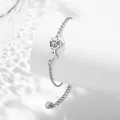 Silver stainless steel bracelet featuring a delicate hollow flower pendant and heart tag - August