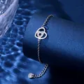 Detail of hollow double heart pendant on stainless steel chain over water ripple background - Double Heart Style (XLY129)
