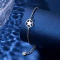 Detailed macro view of a silver stainless steel chain bracelet with a hollow star charm - Five-Pointed Star Style (XLY136)