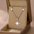 Elegant silver stainless steel North Star necklace displayed in a luxury gold jewelry gift box - Octagonal Star Style (TZ-480)