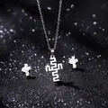 Detailed view of polished stainless steel jewelry set with geometric cross patterns - Maze Cross Style (TZ-431)