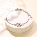 Bracciale minimalista in acciaio inossidabile con ciondolo a cuore e gatto su supporto - Argento (XLY229)