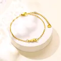 Gouden roestvrijstalen hondenarmband met karabijnsluiting en hartvormige hanger - Goud (XLJ218)