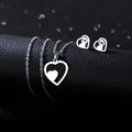 Poliertes Herz-Halsketten- und Ohrring-Set aus Edelstahl auf schwarzem Leder - Verschachteltes Herz Stil (TZ-449)