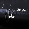 Detailed close-up of silver stainless steel heart and heartbeat necklace and earrings set - ECG Heartbeat Style (TZ-451)