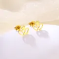 Detailed close-up of golden crown heart stud earrings on a pearly white pedestal - Heart and Crown Combo (SD27)