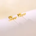 Macro shot of polished gold-plated Sweet script stud earrings with smooth finish - Sweet Artistic Letters (SD29)