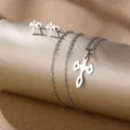 Polished stainless steel jewelry set featuring hollow cross necklace and stud earrings - Variant Hollow Cross (TZ-476)