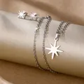 Macro shot of silver octagonal star jewelry set including necklace and stud earrings - Octagram (TZ-480)