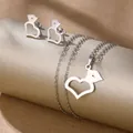 Detailed view of silver stainless steel jewelry set with heart and animal cutout charms - Abstract Animal Heart (TZ-486)