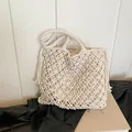 White macramé woven tote bag with fringe detail for bohemian summer beach vacations - White